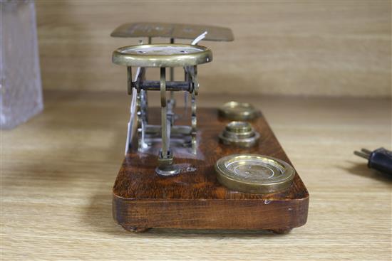 A set of postal scales and a set of apothecary scales